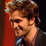 Actor Robert Pattinson accepts an award onstage during the Teen Choice Awards 2009 held at the Gibson Amphitheatre on August 9, 2009 in Universal City, California.
