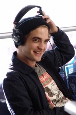 rob-taking-off-earphones rob-taking-off-earphones